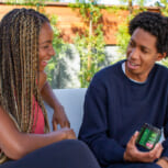 SISTER-BROTHER-ENJOYING-MODAE-CDB-GUMMIES-OUTDOORS